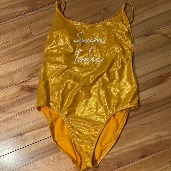 No boundaries gold foil sparkle one piece graphic swim suit. NWOT. medium (7-9) - Picture 1 of 4